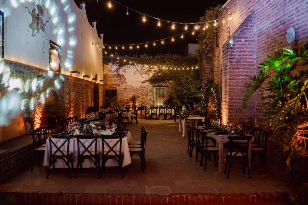 An elegant wedding reception setup with table settings and lighting — Las Vegas wedding packages