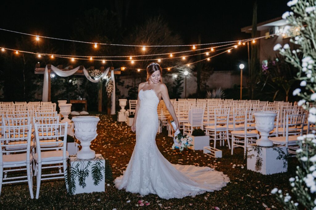An enchanting garden wedding setup with floral arrangements and fairy lights — Las Vegas wedding themes