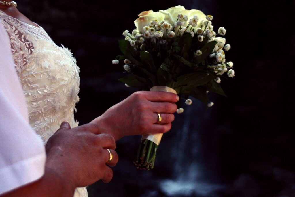 An intimate wedding scene at the Little White Wedding Chapel with floral decorations. — unique wedding venues Las Vegas
