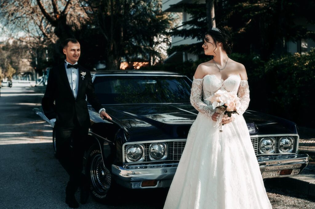 Couple dressed in vintage attire celebrating a classic Vegas wedding. — themed weddings Las Vegas