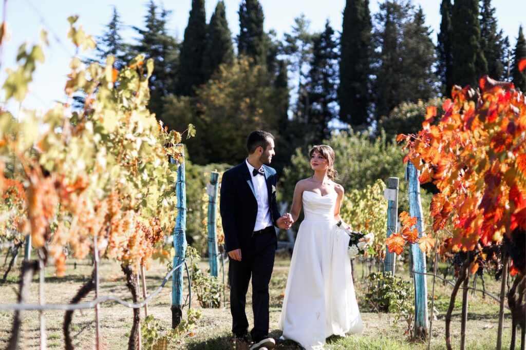 Couples celebrating a wedding during the fall in front of a scenic backdrop. — best time to get married Las Vegas