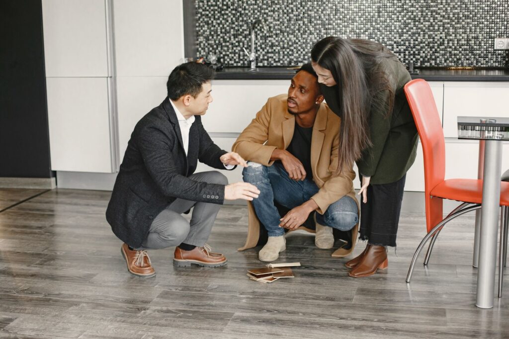 Couples discussing transportation options with a wedding planner, showcasing the planning process. — las vegas wedding t…