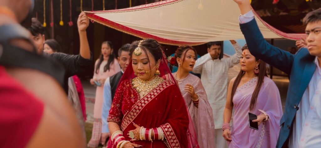 Guests enjoying a destination wedding, showcasing their outfits and accessories. — destination wedding packing list