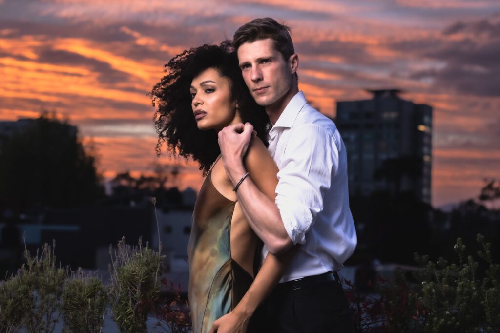 A beautiful couple posing in front of the Las Vegas Strip at sunset. — Las Vegas wedding photography
