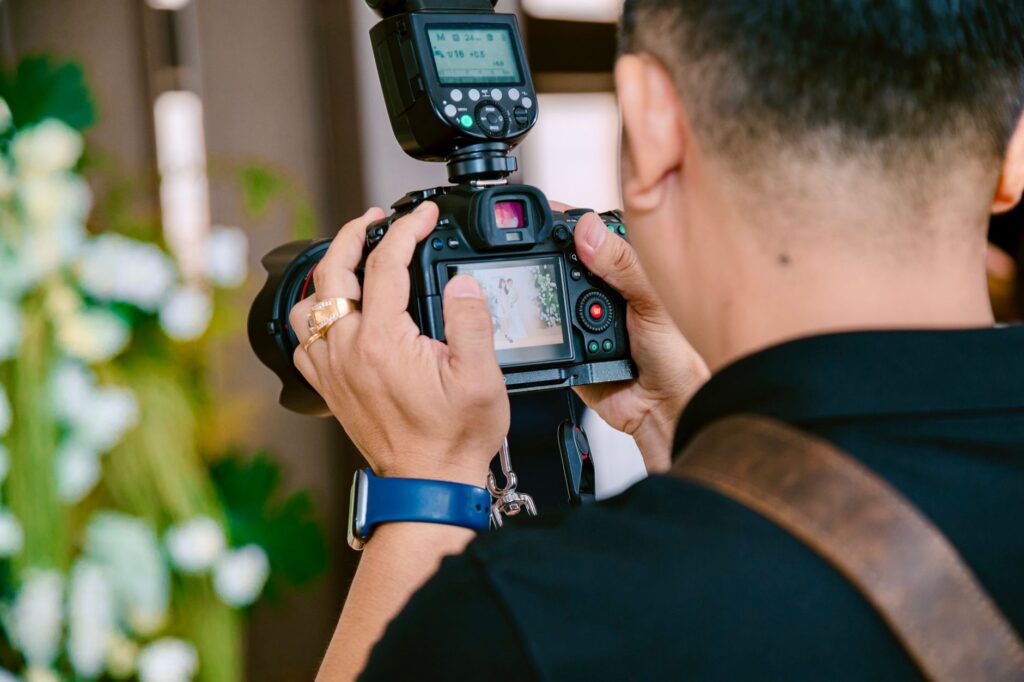 A beautiful outdoor wedding setting in Las Vegas, showcasing a photographer capturing the moment. — Las Vegas wedding ph…