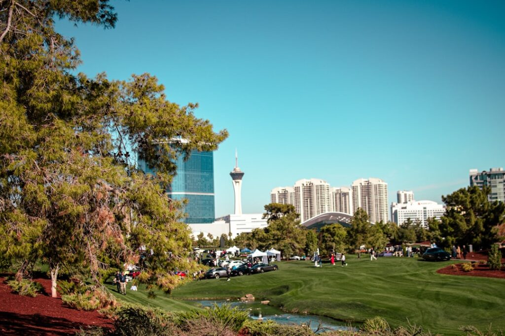A beautiful outdoor wedding setup in Las Vegas during spring with blooming flowers and a clear blue sky. — best time for…