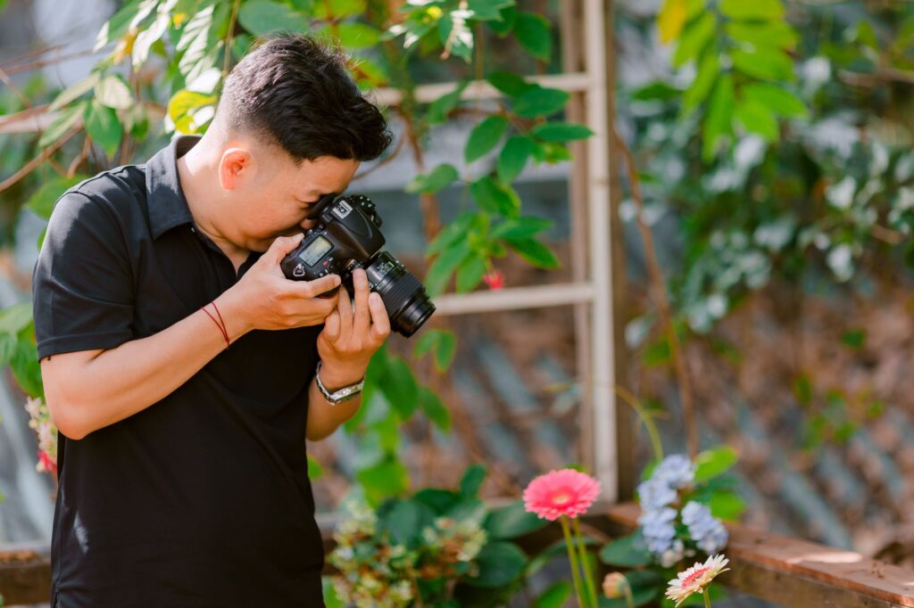 A beautiful outdoor wedding setup in Las Vegas with a photographer capturing the moment. — Las Vegas wedding photographers