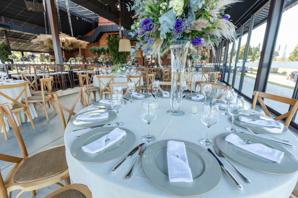 A beautifully set wedding table at a Las Vegas venue showcasing catering options. — Las Vegas wedding vendors