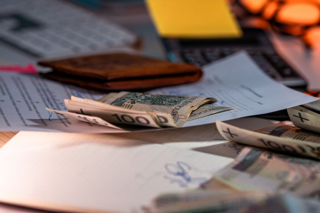 A close-up of wedding planning materials, including contracts and budgets. — wedding planner Las Vegas