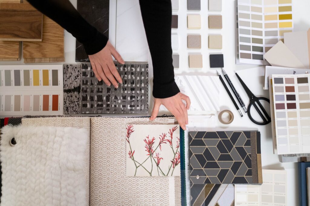 A close-up of wedding planning materials, such as mood boards and color palettes. — choosing wedding planner Las Vegas