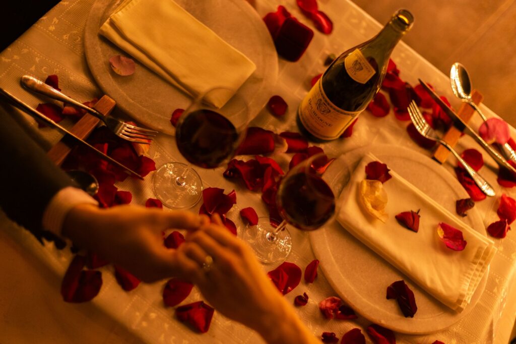 A couple celebrating their elopement with a romantic dinner at a top Vegas restaurant. — Las Vegas elopement guide