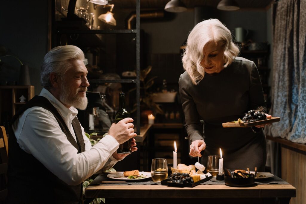 A couple celebrating their elopement with a romantic dinner, showcasing Las Vegas elopement tips for a memorable experience