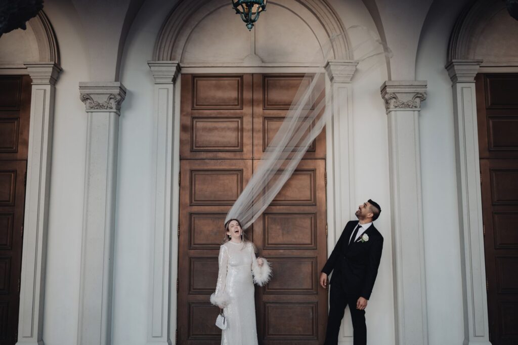 A couple celebrating their vintage glamour wedding in Las Vegas with elegant decor. — Las Vegas wedding themes