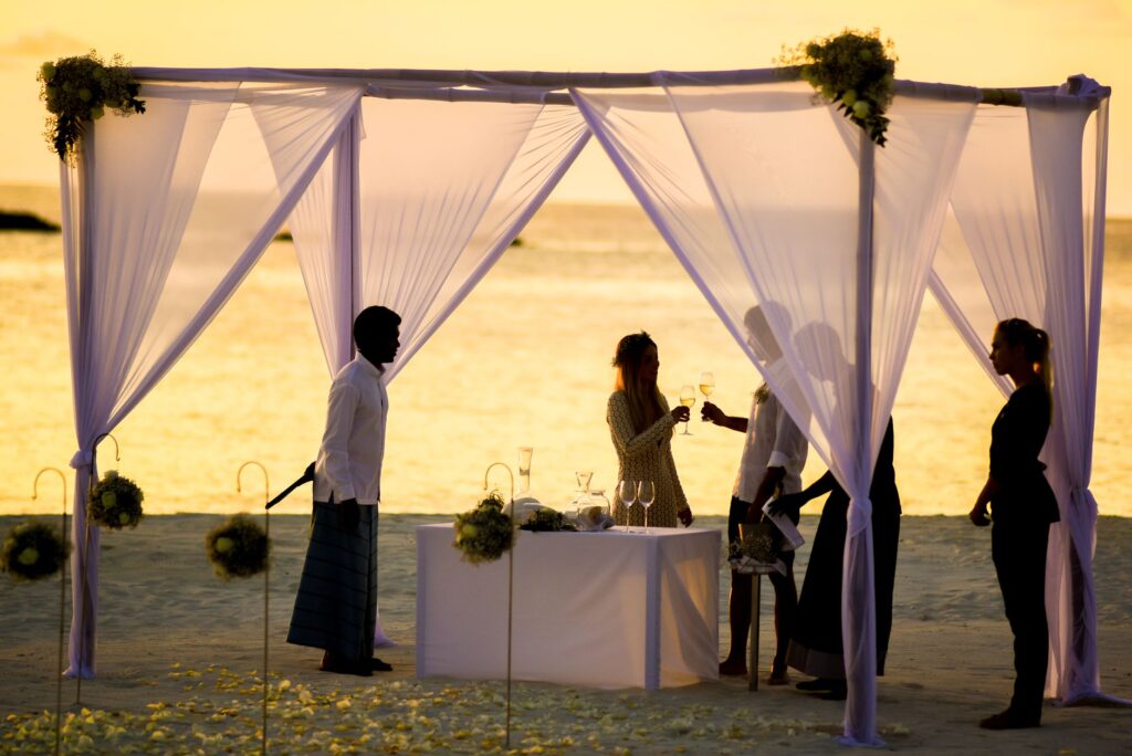 A couple enjoying a romantic Las Vegas wedding reception at sunset. — best time to get married Las Vegas