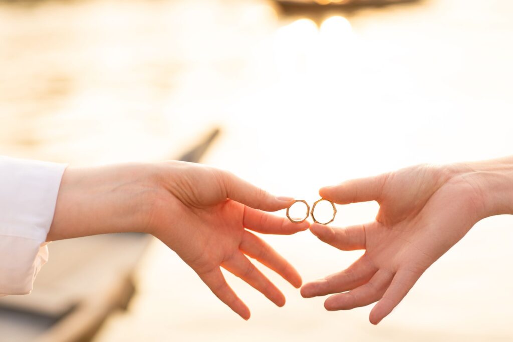 A couple exchanging vows against a desert backdrop during sunset. — Las Vegas elopement