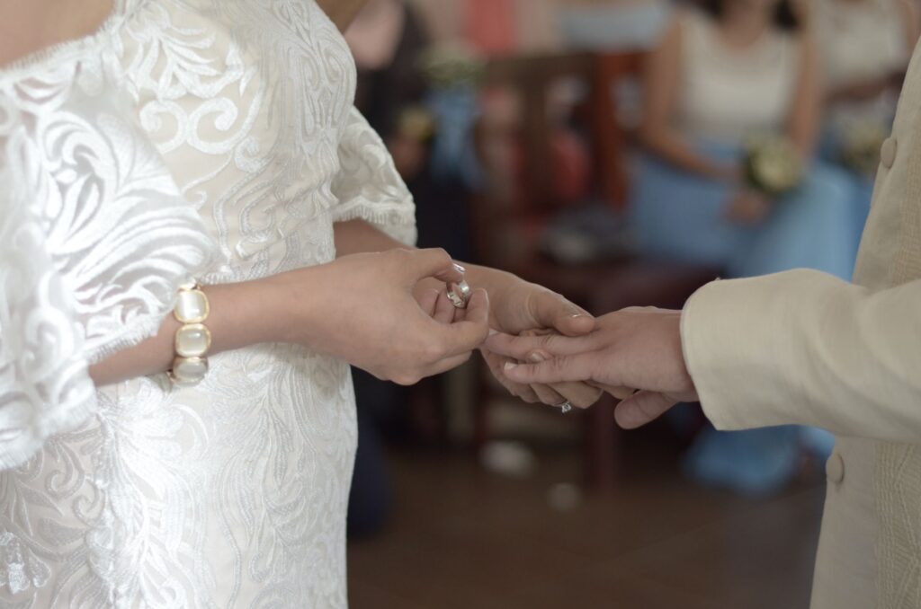 A couple exchanging vows at a scenic Las Vegas chapel. — Las Vegas wedding planning checklist