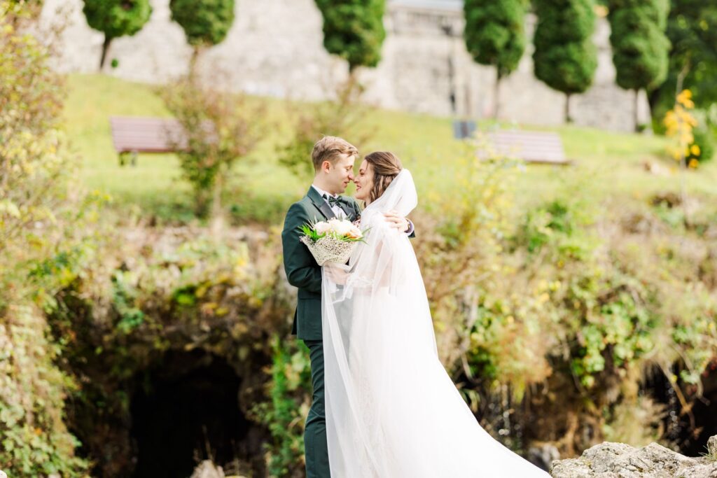 A couple exchanging vows in a picturesque Las Vegas chapel. — best time to get married Las Vegas