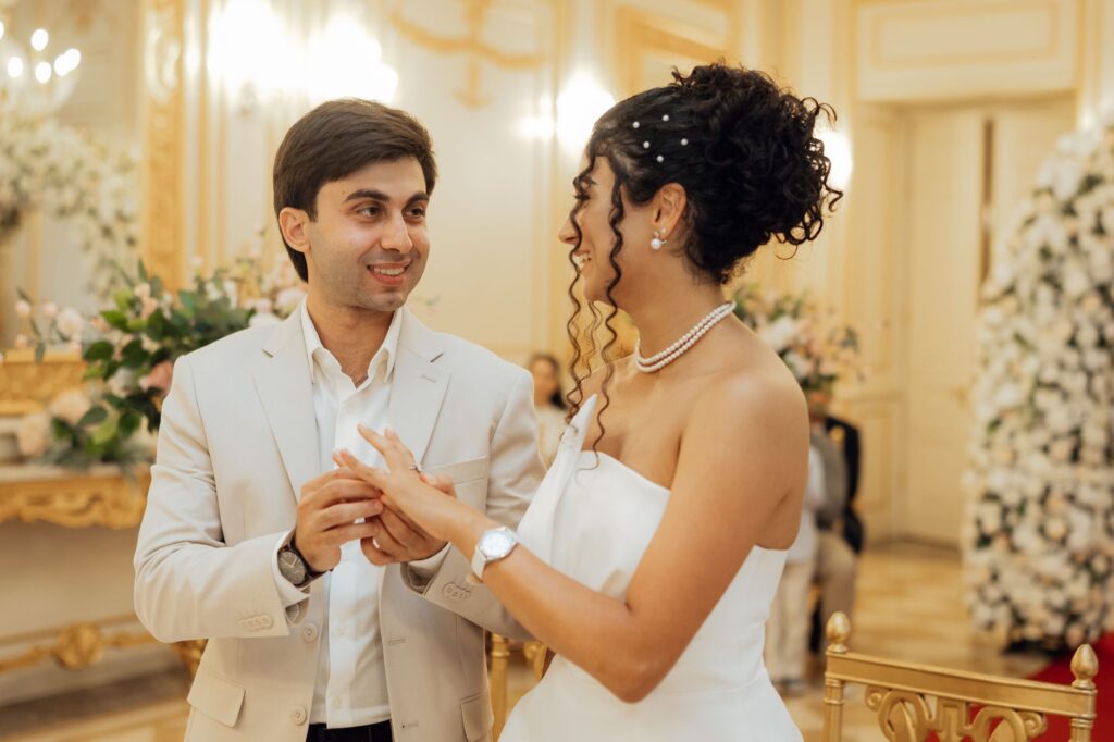 A couple exchanging vows in a unique venue, surrounded by personalized decor. — 2026 Las Vegas wedding trends