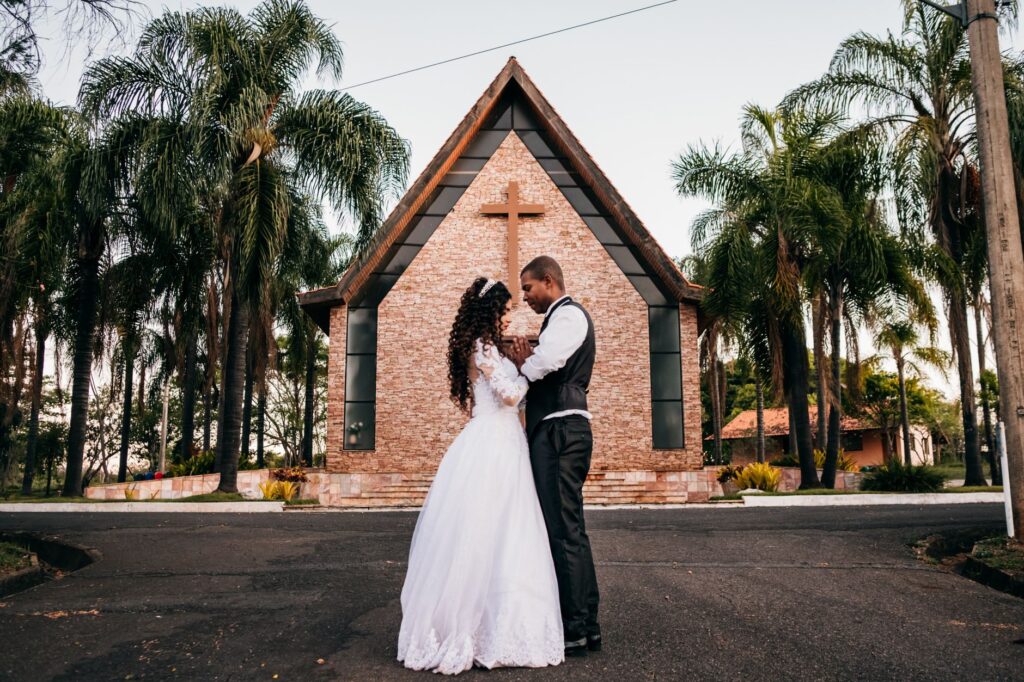 A couple getting married at the Graceland Wedding Chapel, capturing their joyful moment. — best wedding chapels Las Vegas