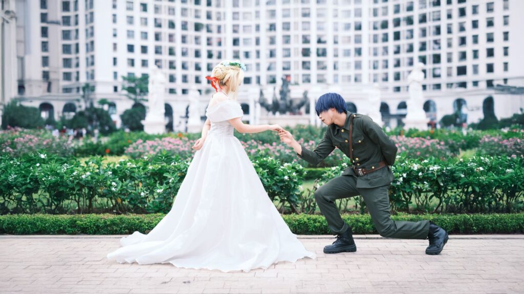A couple posing with an Elvis impersonator during their wedding ceremony. — Las Vegas wedding culture
