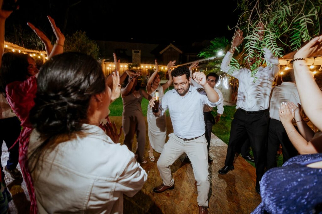A fun wedding reception with guests enjoying games and activities. — budget wedding ideas Las Vegas
