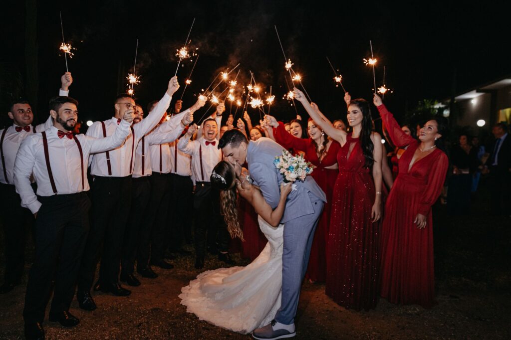 A happy couple celebrating with their wedding planner after a successful event. — Las Vegas wedding planner