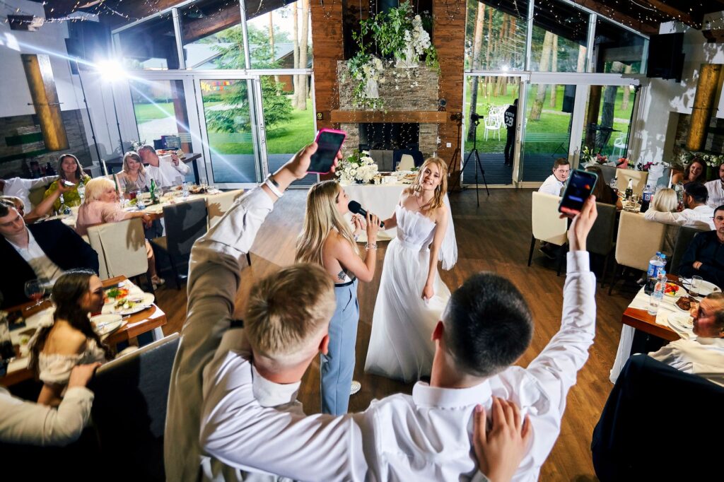 A joyful group of friends during a Las Vegas wedding rehearsal dinner. — Las Vegas wedding checklist