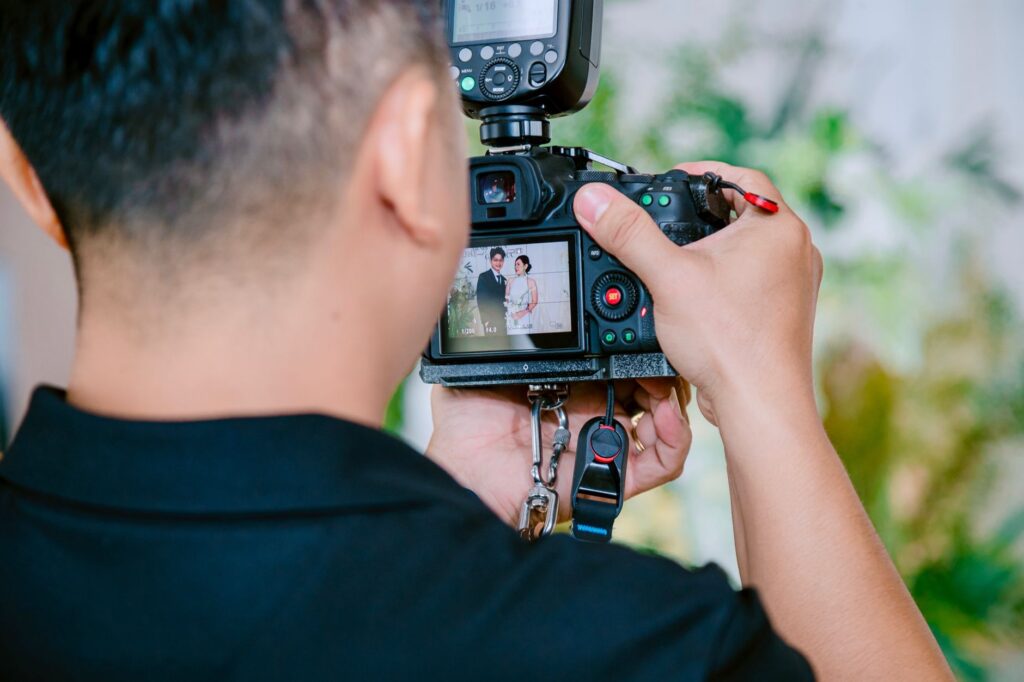 A photographer capturing the essence of a wedding ceremony. — Las Vegas wedding vendors