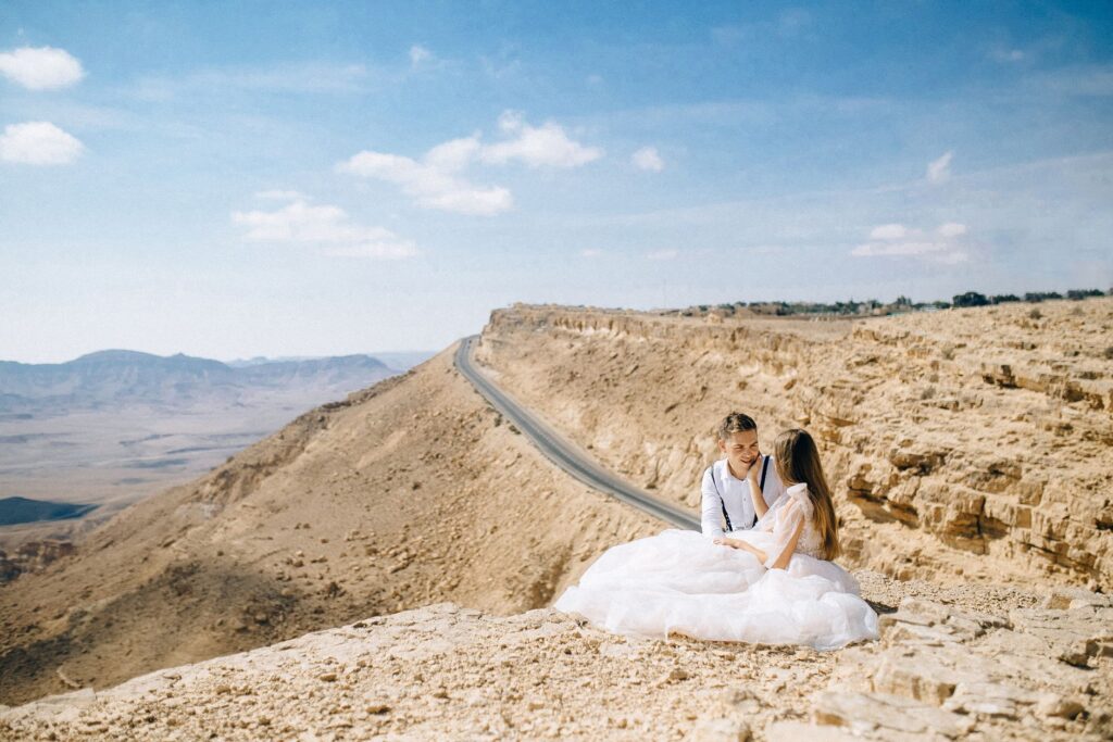 A picturesque outdoor wedding photo with the couple against a backdrop of the Red Rock Canyon. — Las Vegas wedding photo…