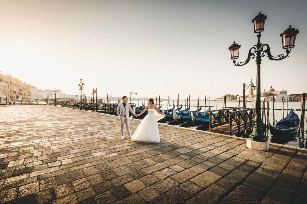 A romantic ceremony setting inside The Venetian featuring gondolas. — Las Vegas wedding venues