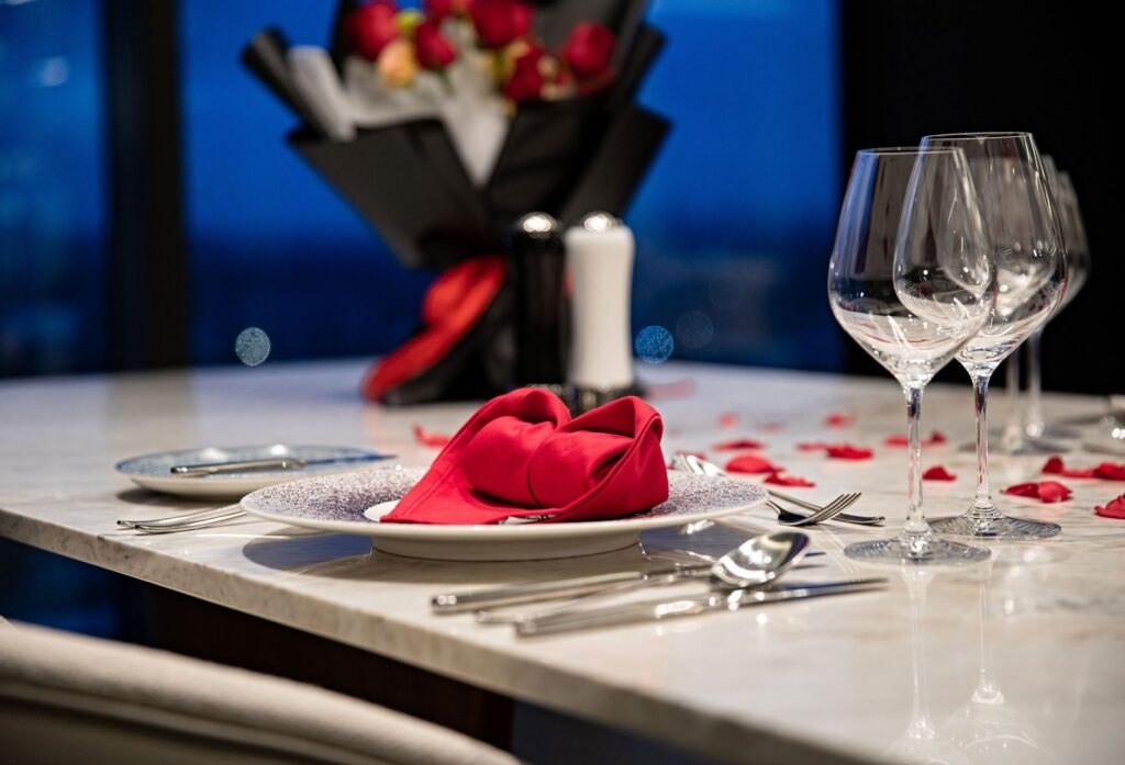A romantic dinner setup for two at a rooftop restaurant in Las Vegas. — Las Vegas elopement planning