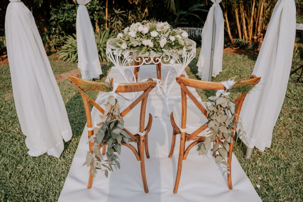 A rustic charm wedding setup featuring wooden elements and floral arrangements. — unique wedding themes in Las Vegas