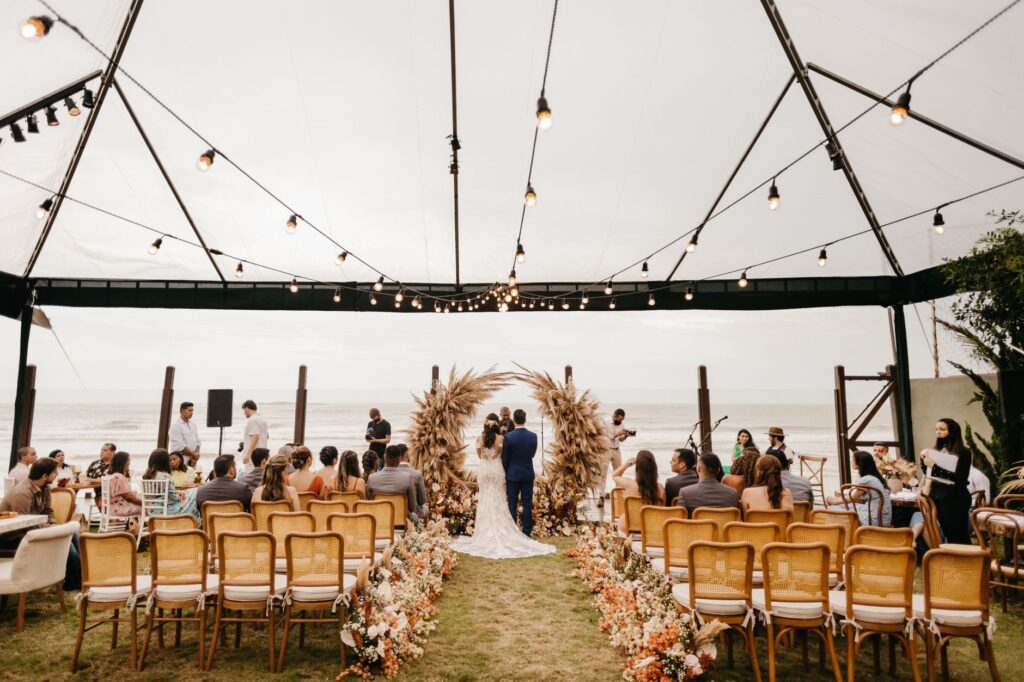 A serene wedding scene with a couple enjoying their day, free from stress thanks to their concierge's coordination. — be…