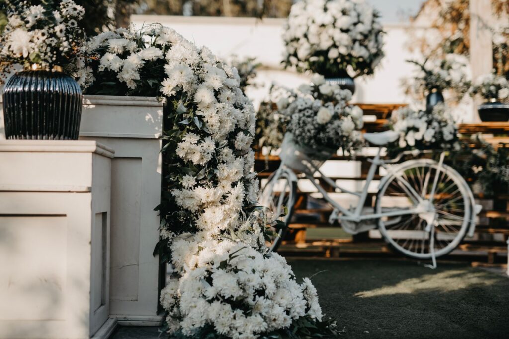 A stunning outdoor wedding setup in Las Vegas during springtime with blooming flowers. — best season for Las Vegas wedding