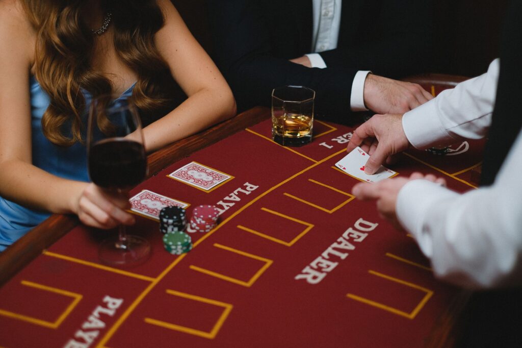 A stylish casino-themed wedding table setting with playing cards and elegant decor. — unique wedding themes Las Vegas