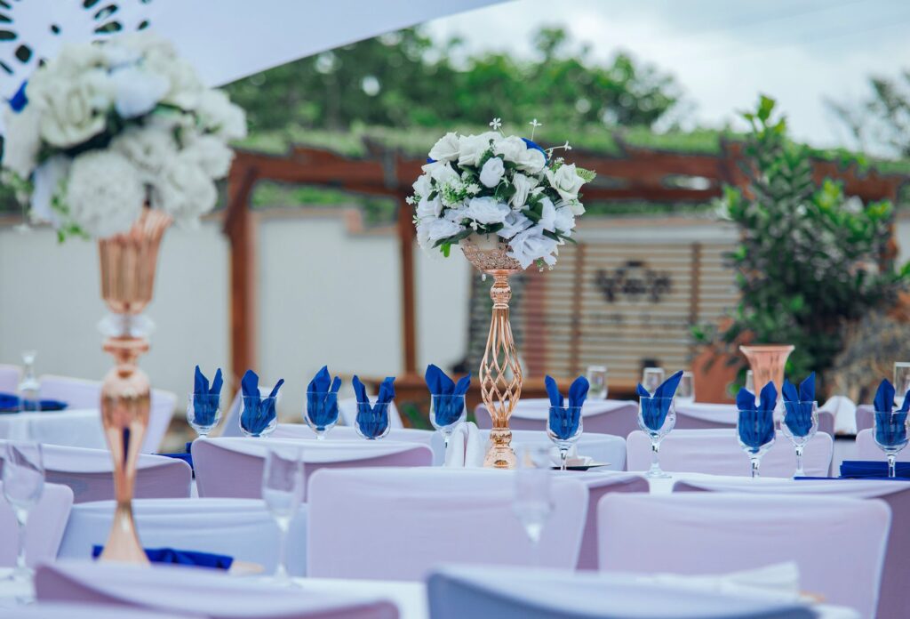 A table set up for a wedding reception featuring floral arrangements. — Las Vegas wedding packages