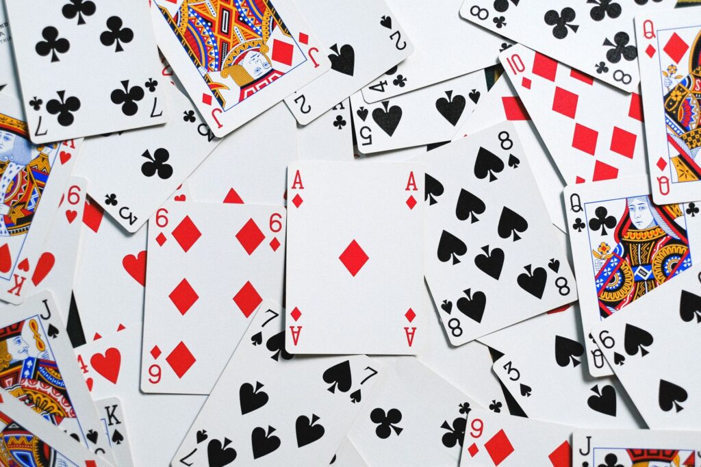 A table setting inspired by a casino theme, complete with playing cards and themed centerpieces. — unique wedding themes…