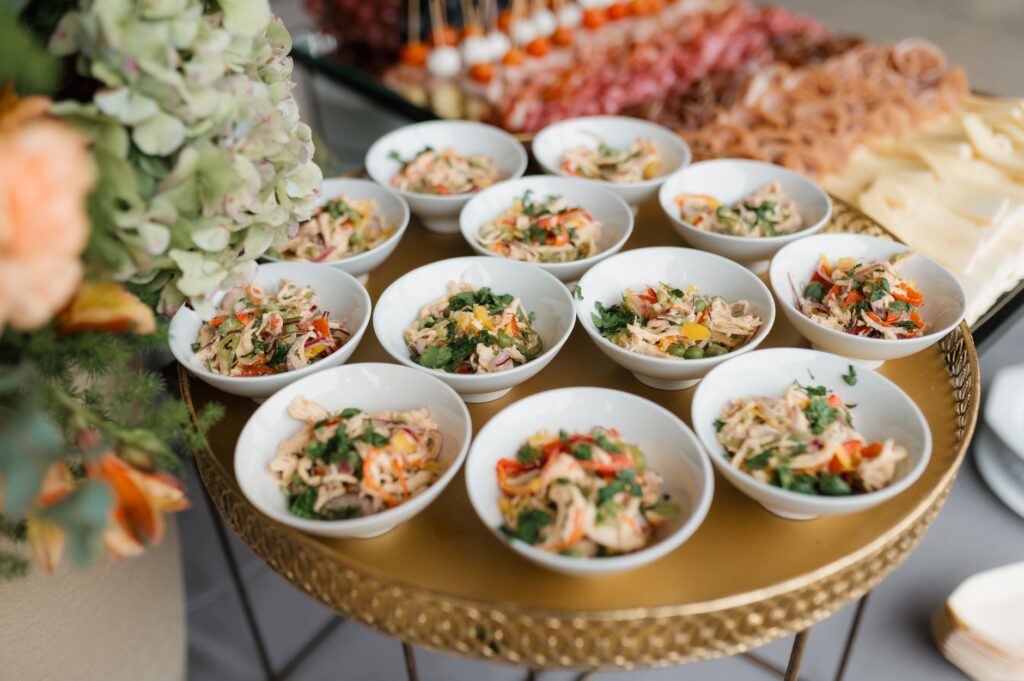 A vibrant food station at a Las Vegas wedding, showcasing a variety of cuisines. — 2026 Las Vegas wedding trends