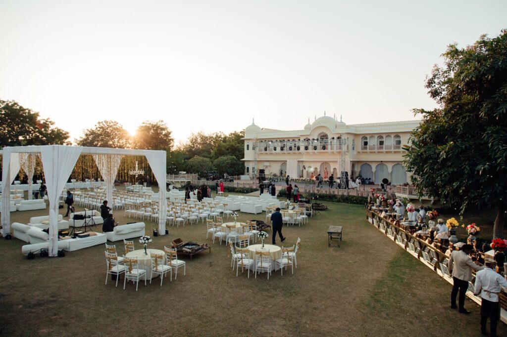 A vibrant summer wedding setup by the poolside with guests enjoying the sun. — best time to get married in Las Vegas