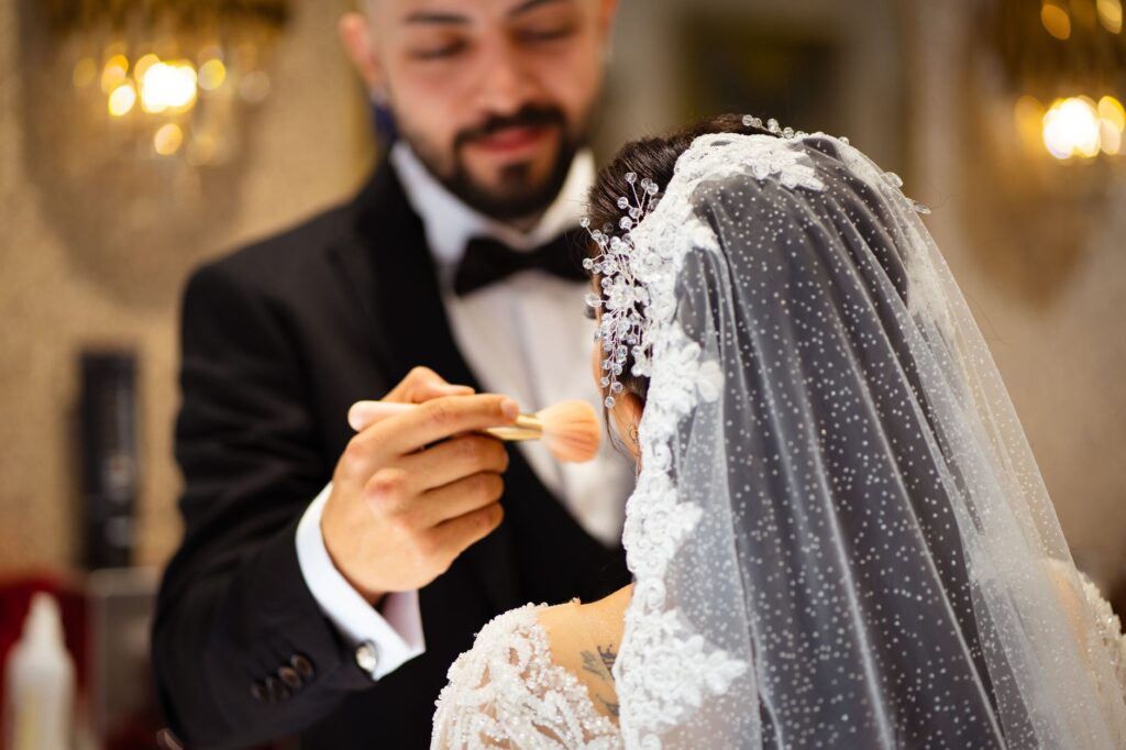 A wedding concierge assisting a couple with planning their special day. — unique wedding packages Las Vegas