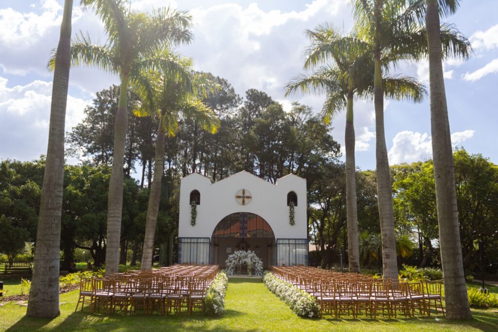 An outdoor ceremony setup at the Little White Chapel with stunning floral arrangements. — best wedding chapels Las Vegas