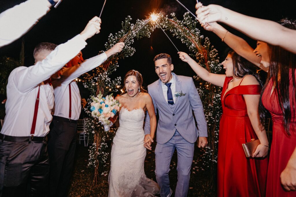 Couples celebrating their marriage with friends and family at a Las Vegas party. — Las Vegas wedding packages