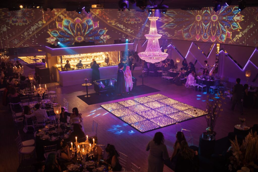 Guests enjoying a Las Vegas wedding reception with vibrant decor. — destination wedding Las Vegas tips