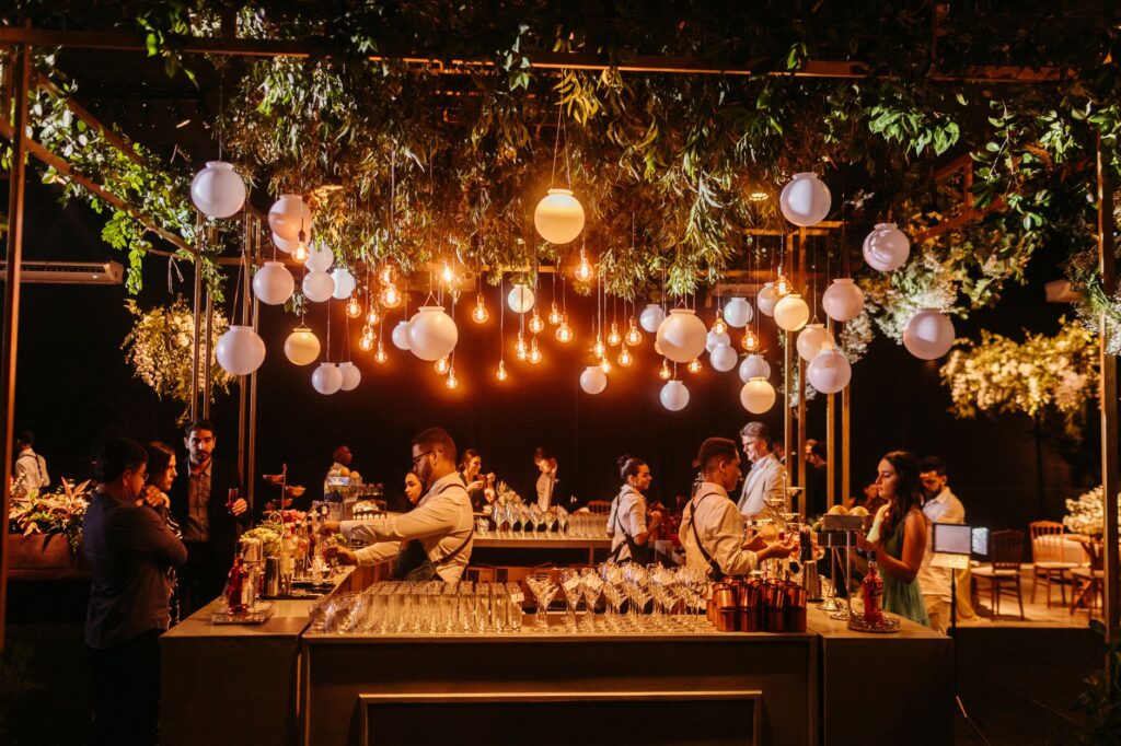 Guests enjoying refreshing cocktails at a summer wedding reception. — summer wedding Las Vegas
