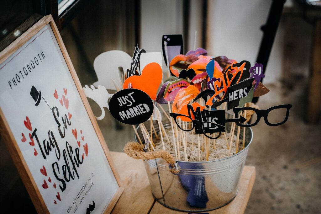 Interactive elements at a themed wedding, such as a photo booth with props. — themed weddings Las Vegas