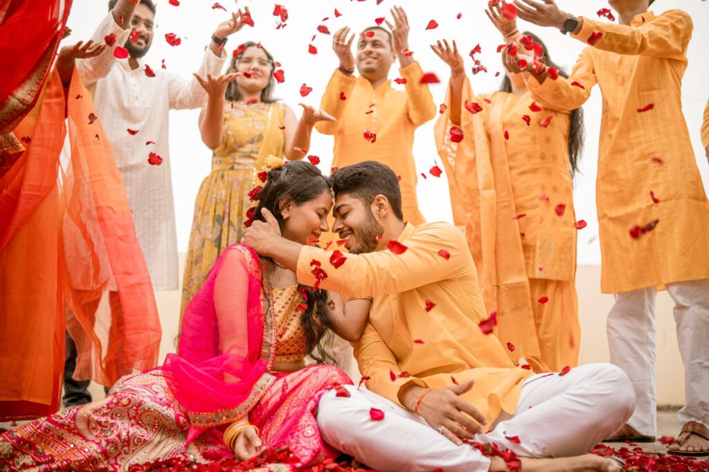 A candid moment of a couple celebrating with friends in a vibrant Las Vegas setting. — Las Vegas wedding photographers