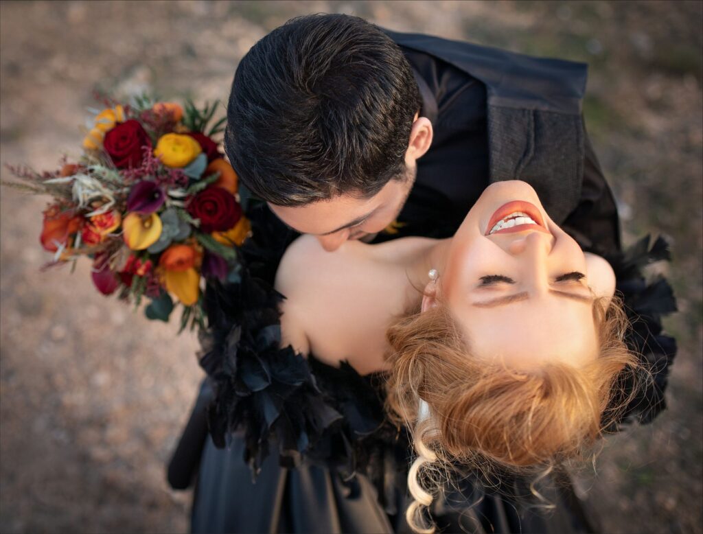 A close-up of a couple laughing during their wedding photoshoot. — Las Vegas wedding photographers