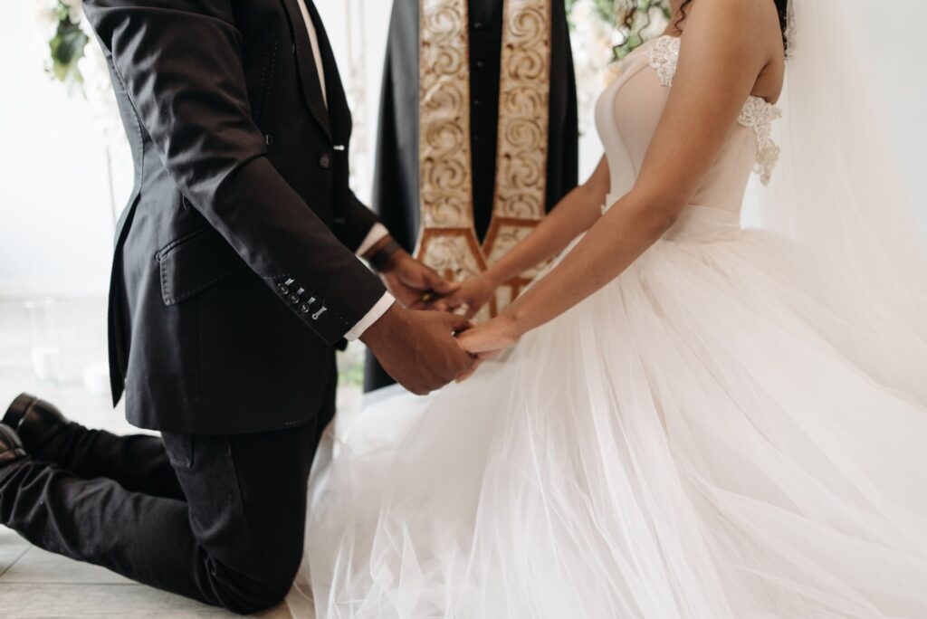 A couple dressed in trendy Vegas wedding fashion, surrounded by a glamorous wedding setup. — Las Vegas wedding trends 2026