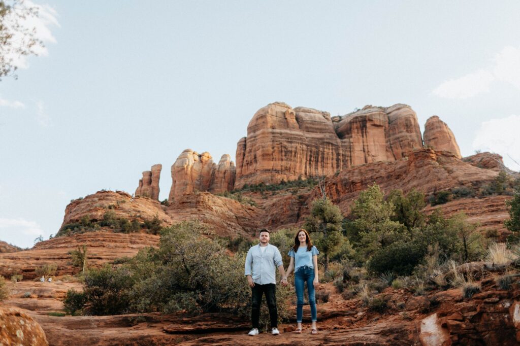 A couple posing for a romantic photo shoot in Red Rock Canyon. — Las Vegas elopement packages