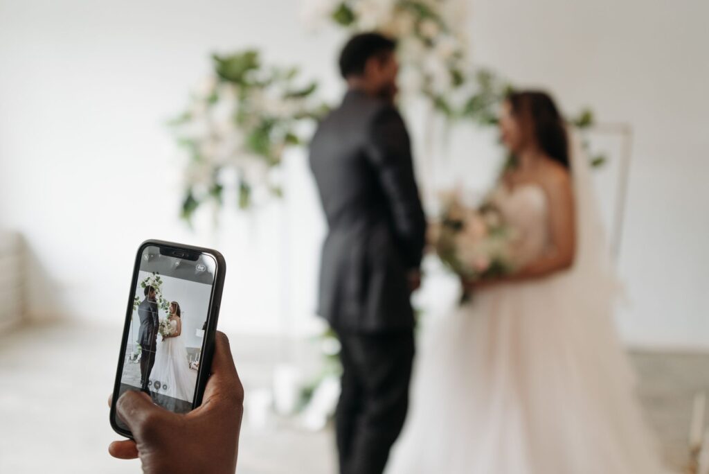 A couple touring wedding venues with their wedding concierge. — questions for wedding concierge